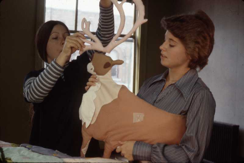 Two women assemble a caribou for Joyce Wieland's Caribou quilt, 1977.