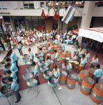 Image of the BWIA Sunjets Steel Orchestra of Trinidad performing outside at the Collonade on Bloor Street, 1968. Photographer: Richard Cole. Image no.ASC06101.