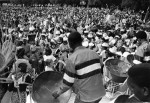 The Esso steel band plays for a large crowd of Caribana participants on Centre Island, 1967. Photographer: Bruce Reed, image no. ASC06135.